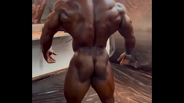 Show Stripped male bodybuilder warm Clips
